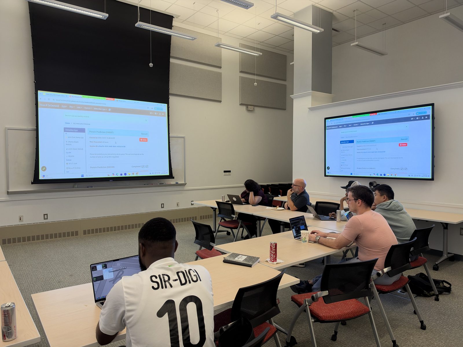 The NVwulf OnDemand portal on screen showing a newly created Protein Prediction session, with attendees following along